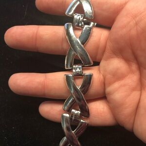 Unsigned silver metal bracelet